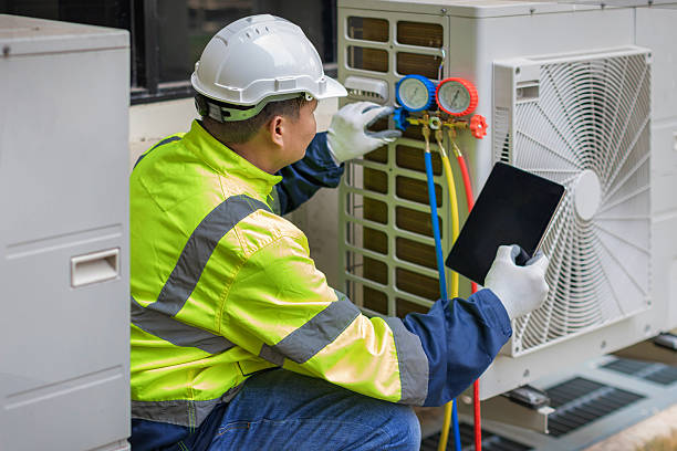Professional Heat Pump Repair technician working in Taunton, MA